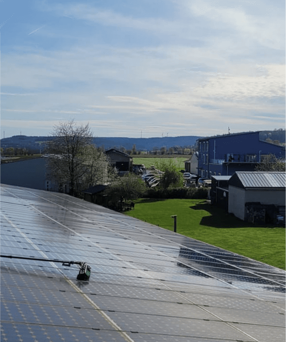 worker-cleaning-solar-panels